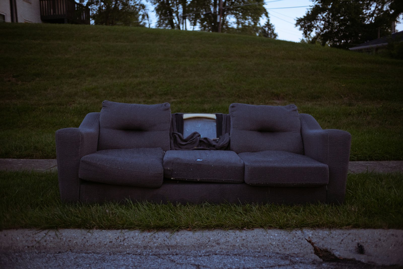 Old couch ready for furniture removal