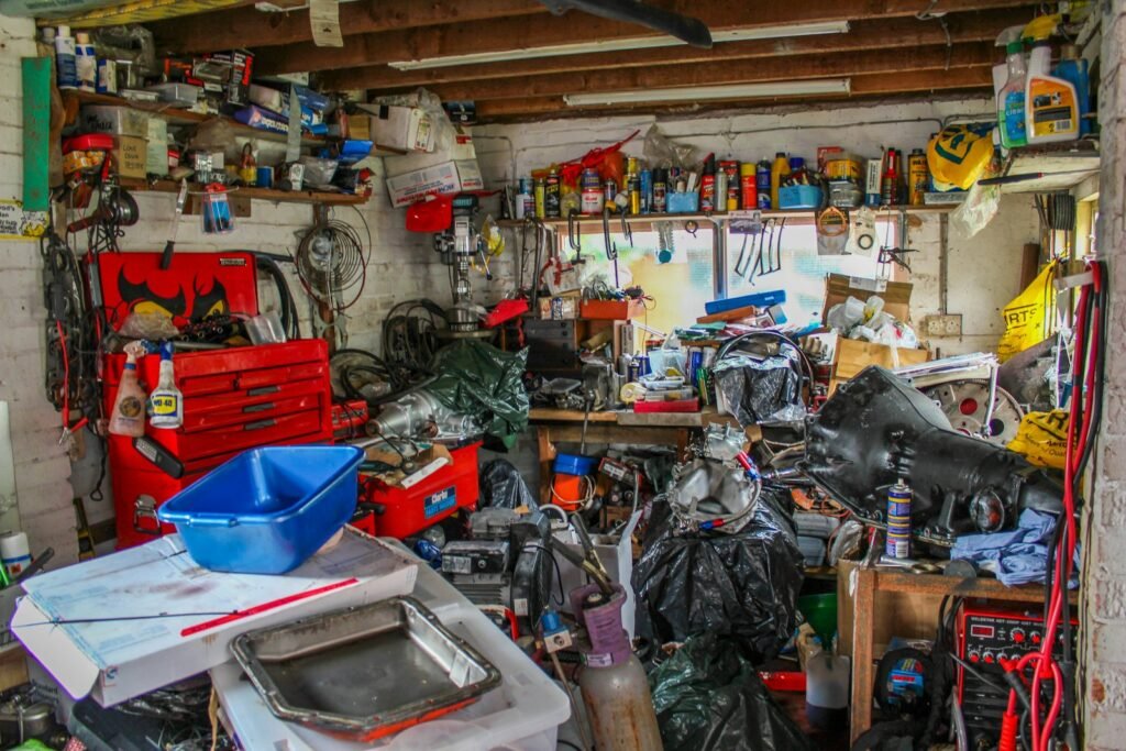 Cluttered garage before a cleanout