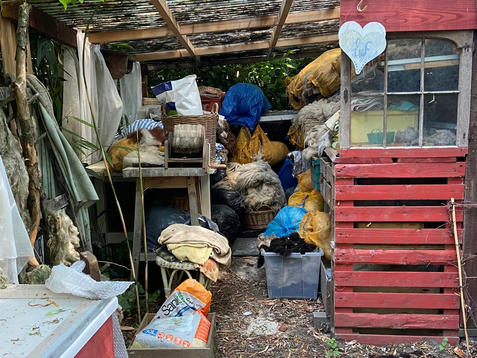 Household junk piled outside a home